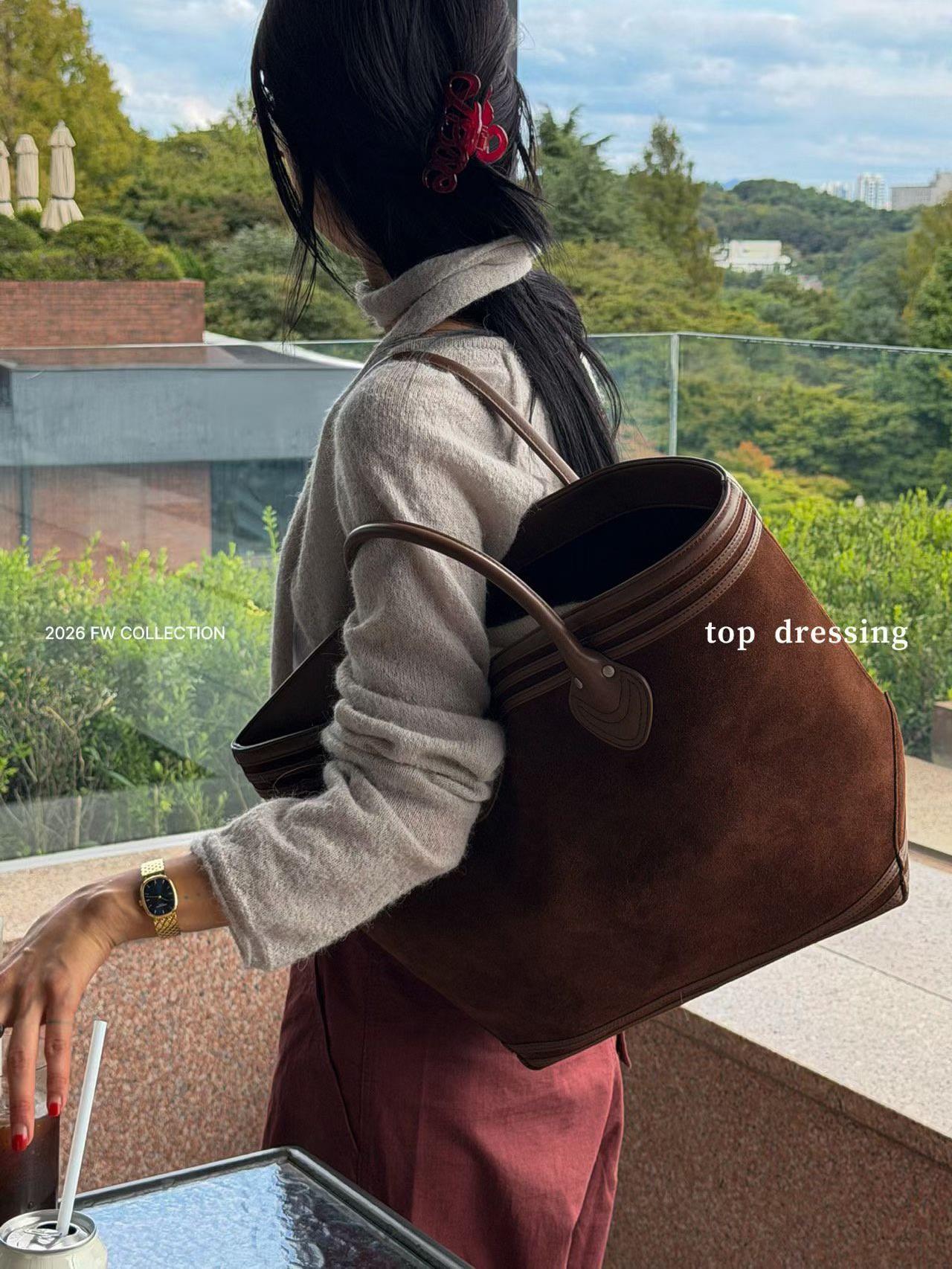 手提麂皮真皮包